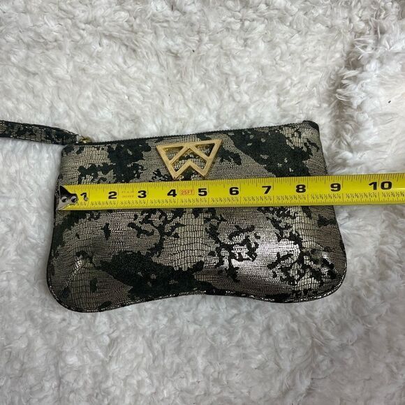 Kelly Wynne metallic gold and black wristlet with a gold tone logo accent - Picture 5 of 8